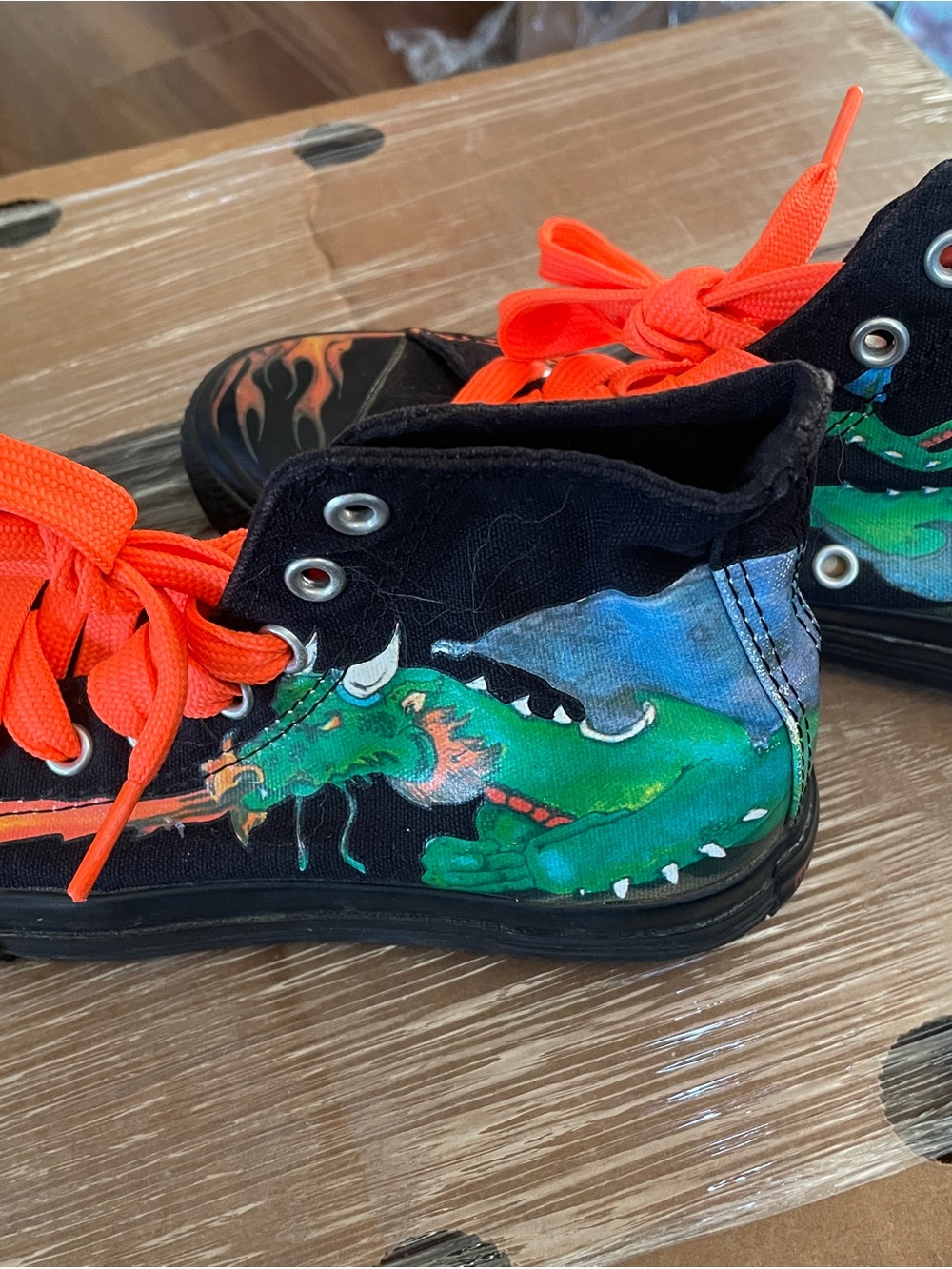 Converse Kids Black High-Top Sneakers with Green Dragon and Bright Orange Laces
